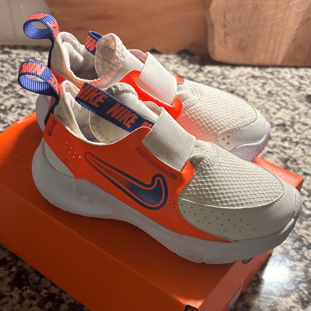 Nike Kids Cream and Orange Slip-On Sneakers with Blue Swoosh